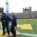 Michigan football announcer Fran Beckmann presents BJ Dickey with the MVP award during the annual alumni flag football game before spring practice at Michigan Stadium on Saturday, April 13, 2013. Melanie Maxwell I AnnArbor.com
